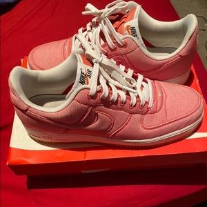 Peach/red Air Force 1s